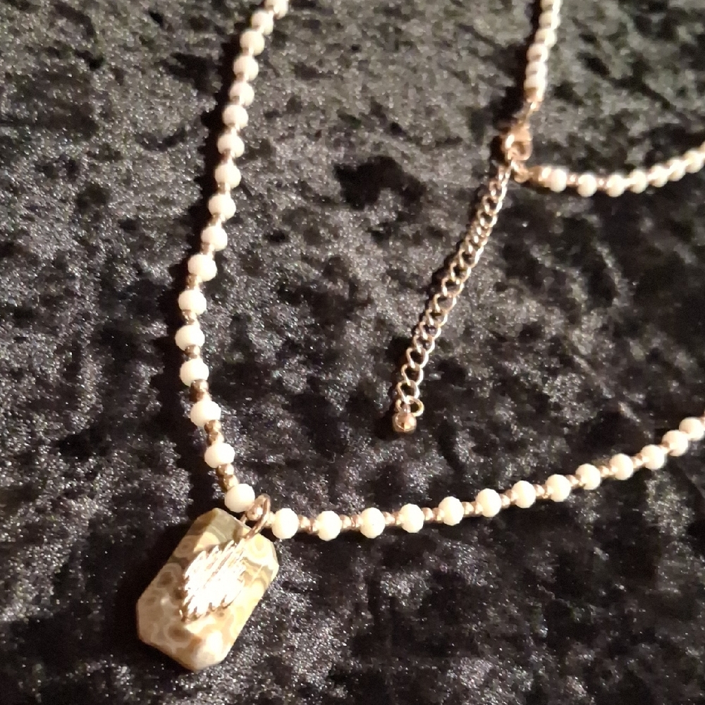 Elegant Pearl Necklace with Gold Accents